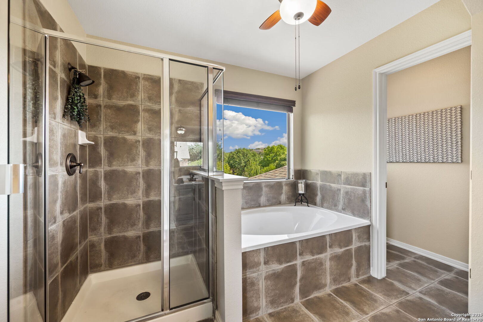 14507 John David Helotes, TX 78023 - Photo 41 of 49 a bathroom with a shower and a tub