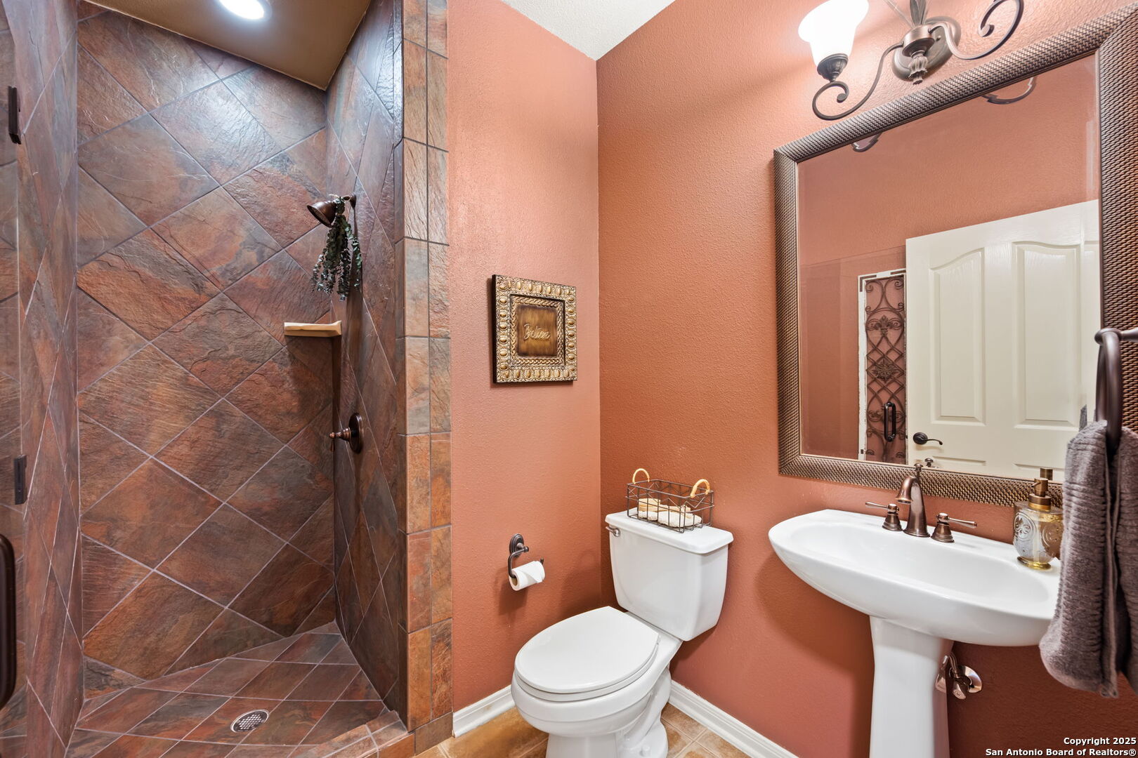 14507 John David Helotes, TX 78023 - Photo 42 of 49 a bathroom with a sink toilet and shower