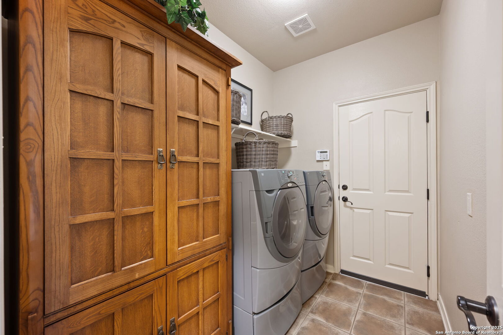 14507 John David Helotes, TX 78023 - Photo 43 of 49 a bathroom with a glass shower door