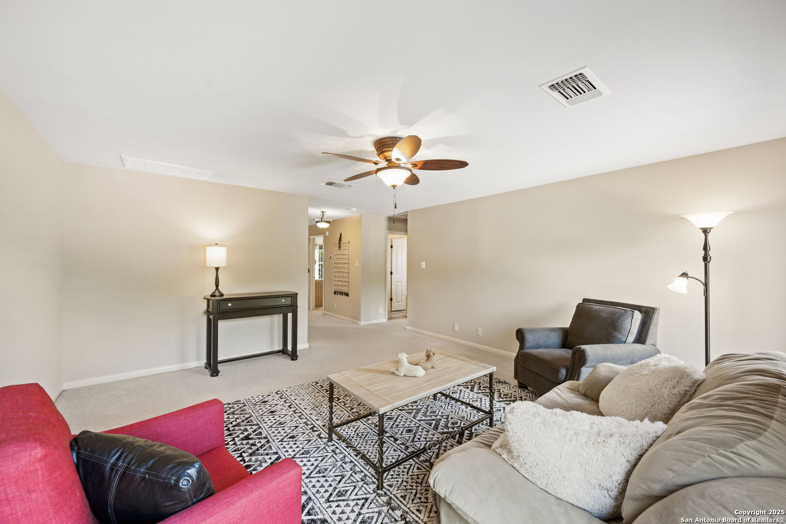 14507 John David Helotes, TX 78023 - Photo 44 of 49 a living room with furniture and a chandelier