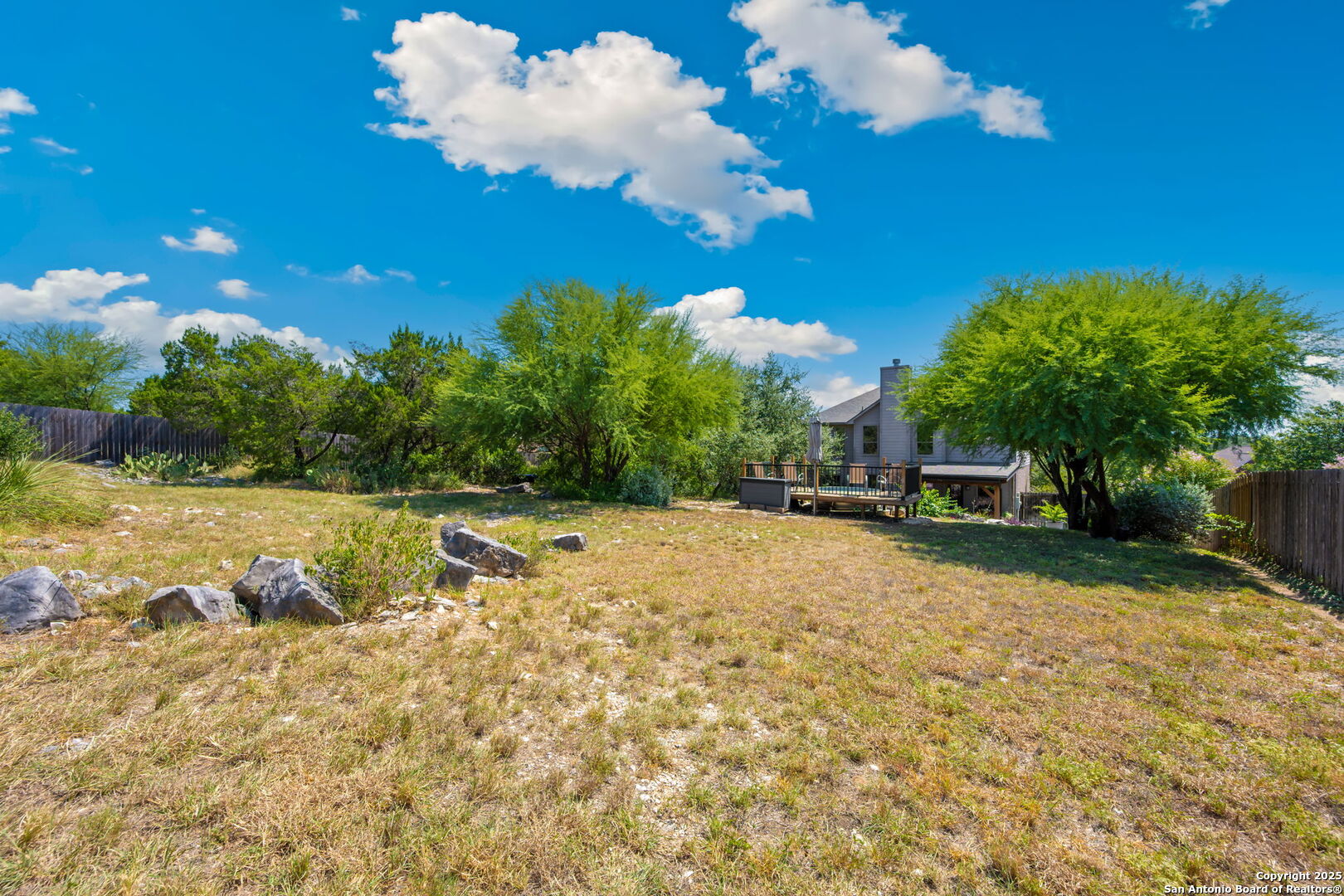 14507 John David Helotes, TX 78023 - Photo 47 of 49 a swimming pool with trees in the background