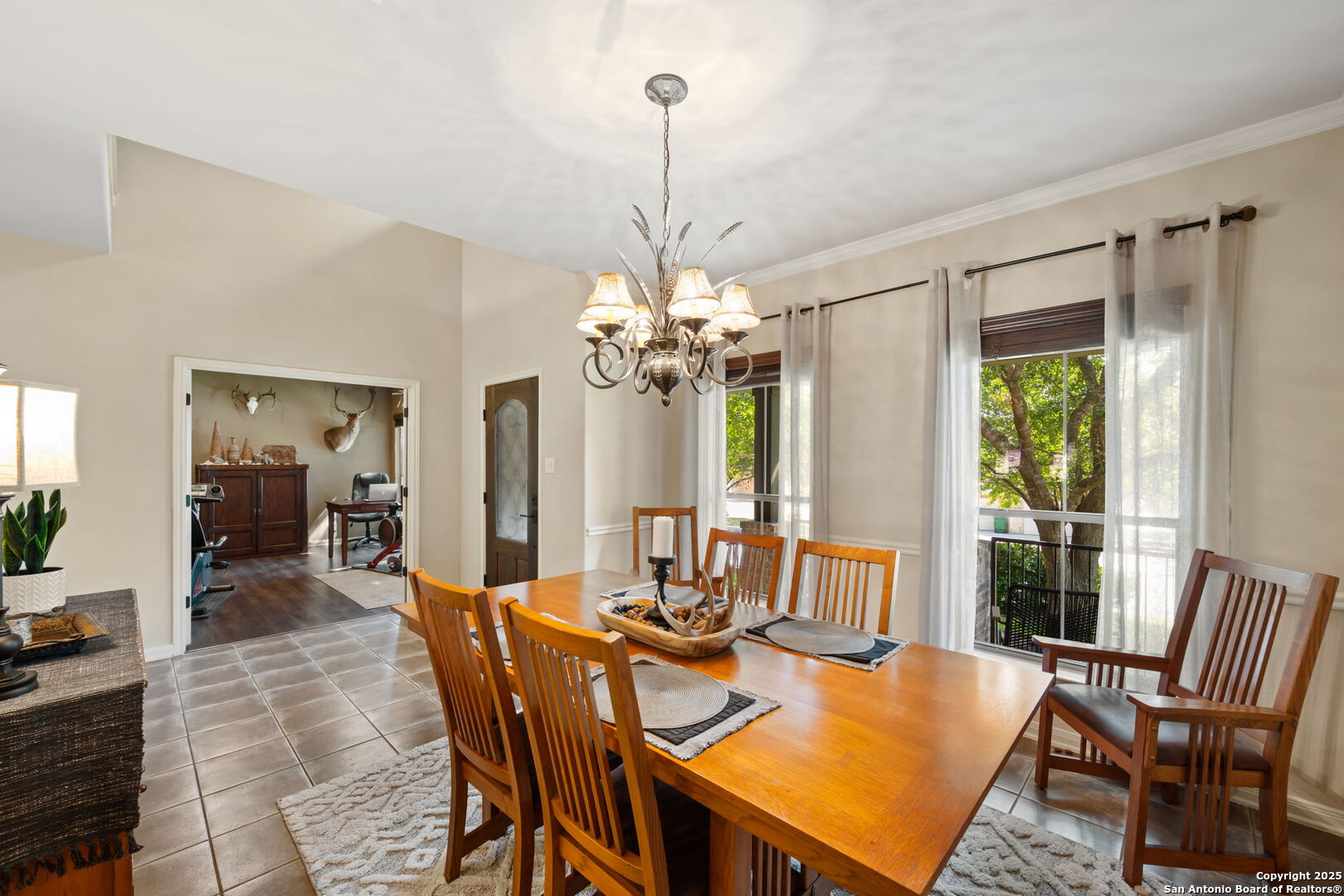 14507 John David Helotes, TX 78023 - Photo 7 of 49 a view of a dining room with furniture window and outside view