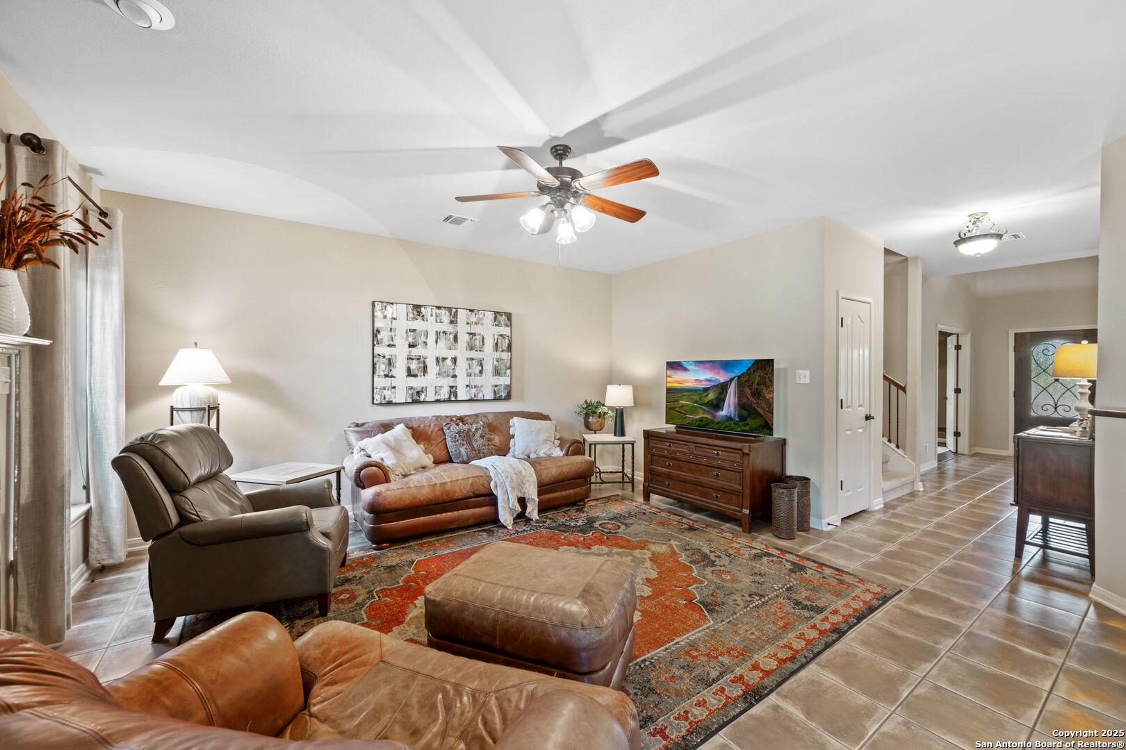 14507 John David Helotes, TX 78023 - Photo 9 of 49 a living room with furniture and a flat screen tv