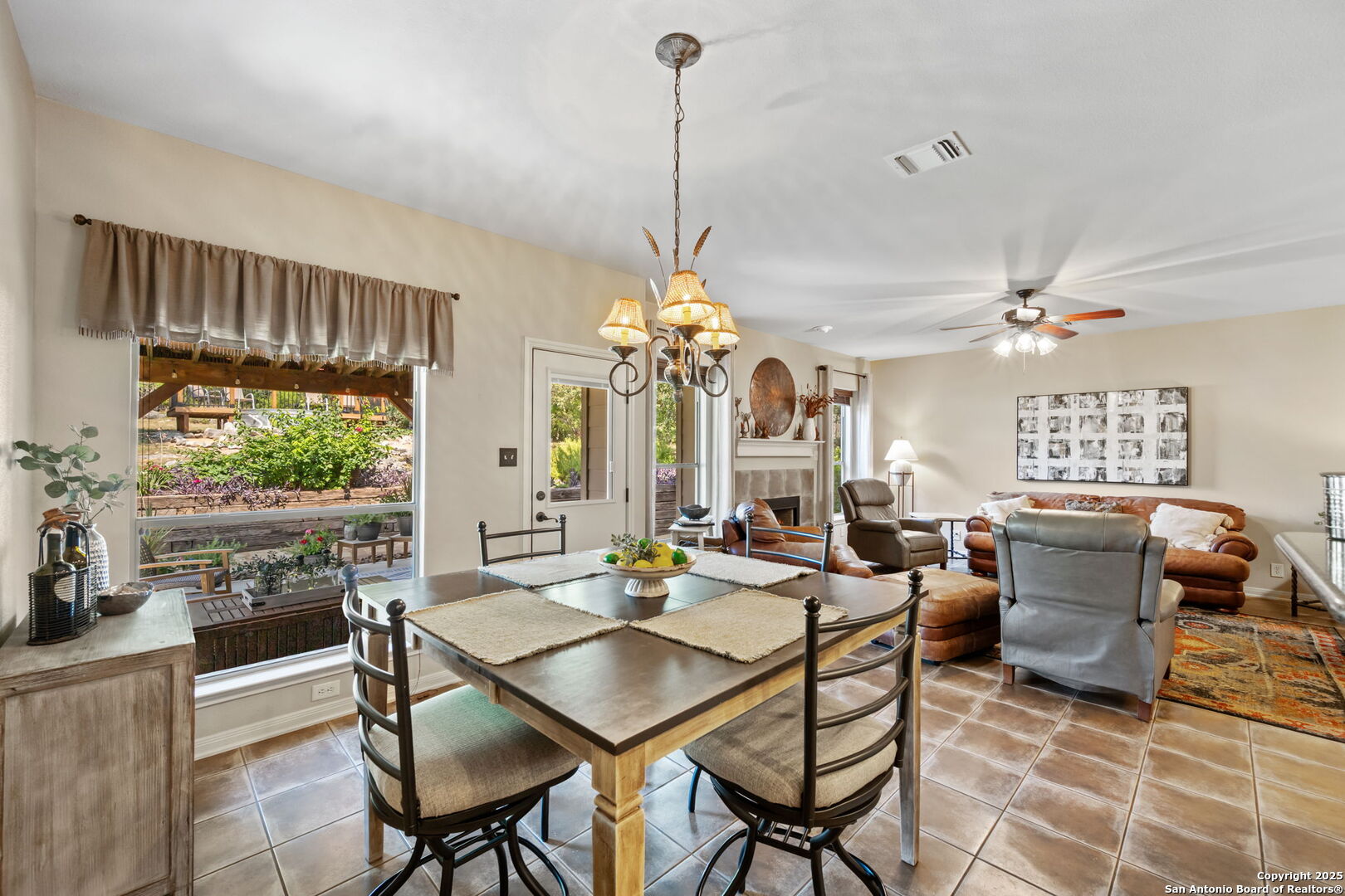 14507 John David Helotes, TX 78023 - Photo 10 of 49 a view of a dining room with furniture window and outside view