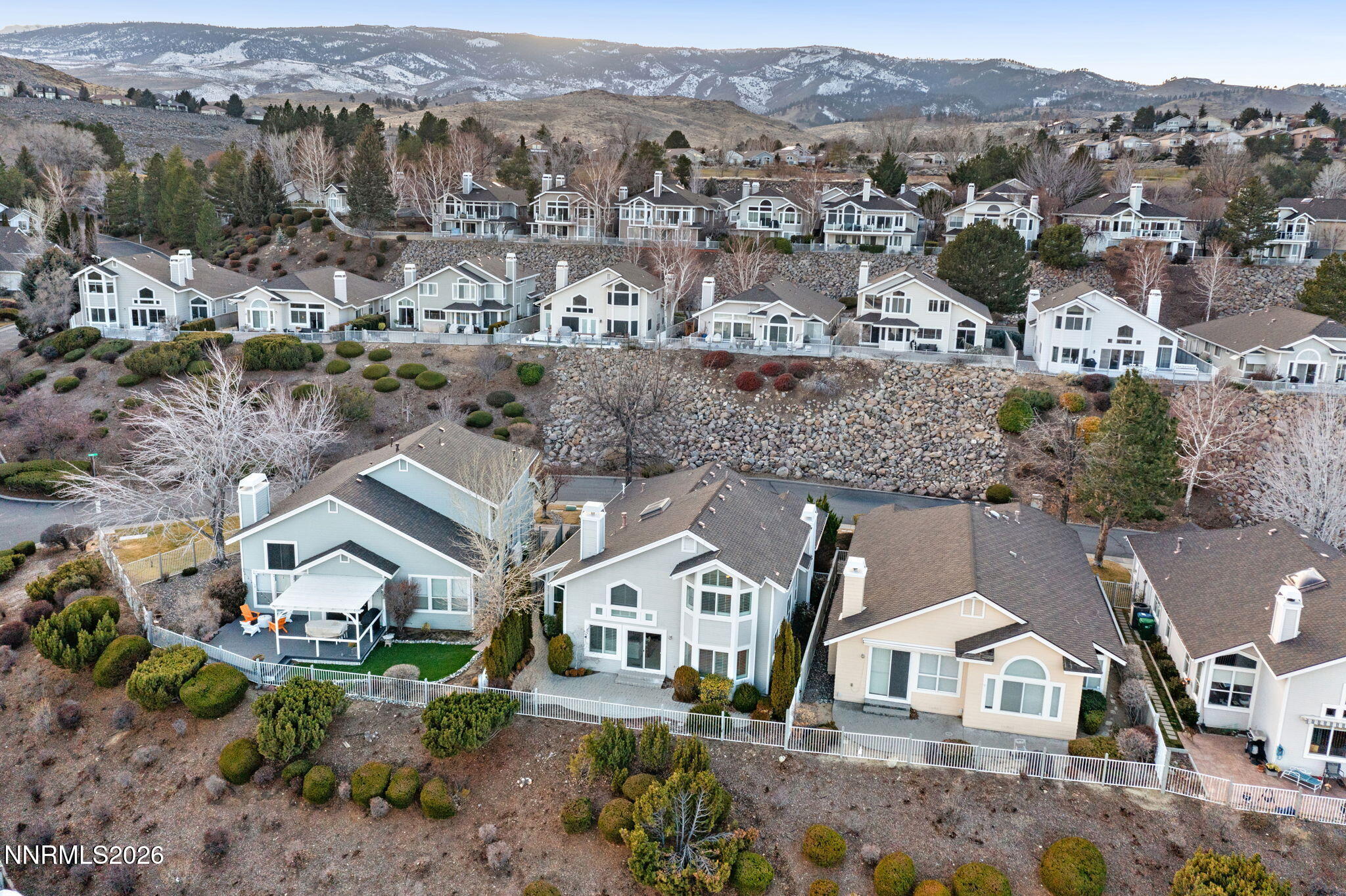 6186 Squires Lane Reno, NV 89519 - Photo 46 of 57 an aerial view of residential houses with outdoor space and parking