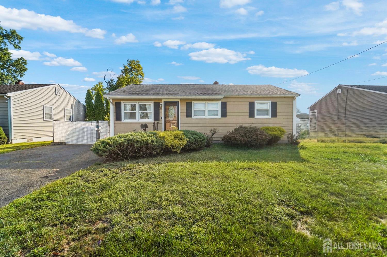 122 3rd Street Middlesex, NJ 08846 - Photo 1 of 24 a front view of a house with a garden