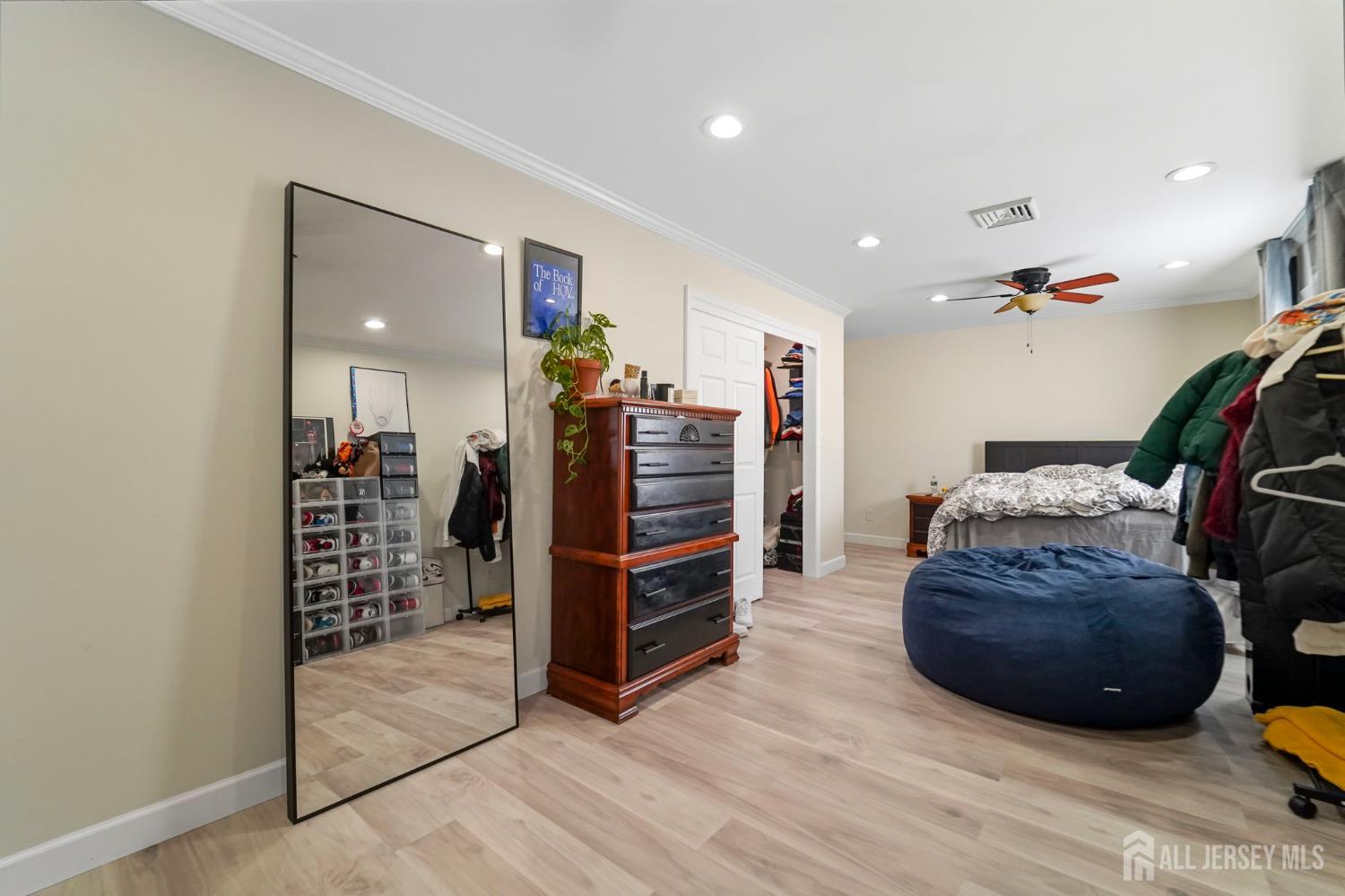 122 3rd Street Middlesex, NJ 08846 - Photo 12 of 24 a living room with furniture and a walk in closet