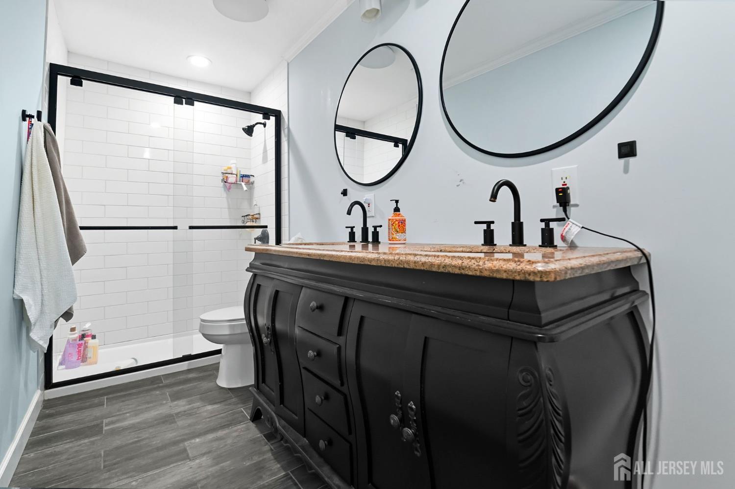 122 3rd Street Middlesex, NJ 08846 - Photo 20 of 24 a bathroom with a sink and a mirror