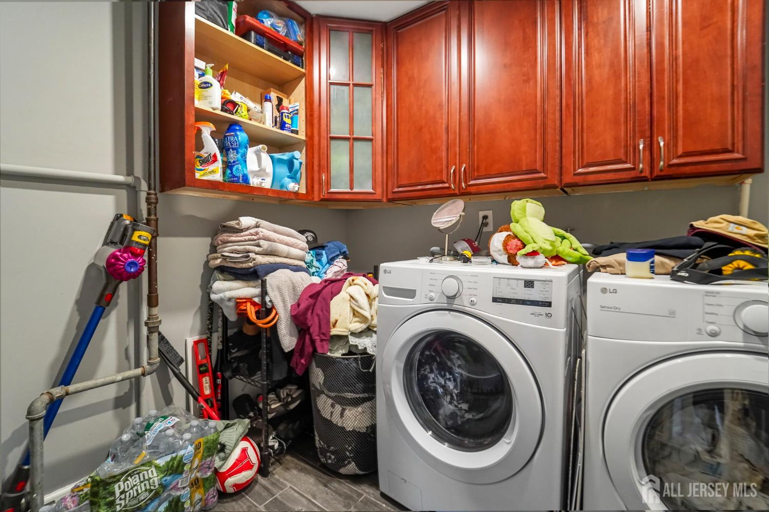 122 3rd Street Middlesex, NJ 08846 - Photo 21 of 24 a utility room with dryer washer and a view of bedroom