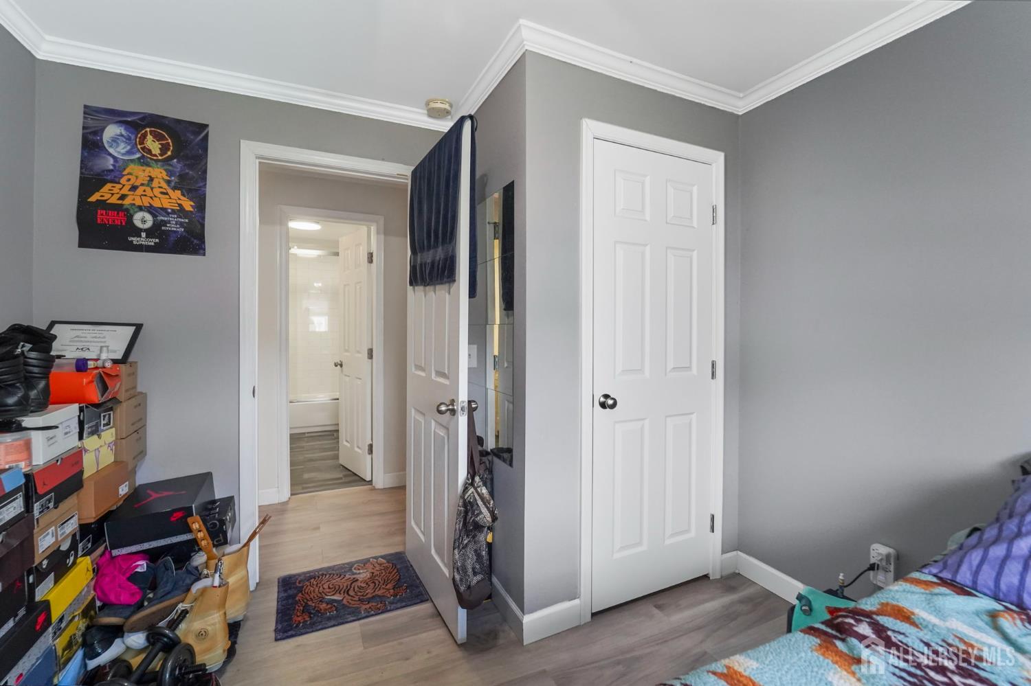 122 3rd Street Middlesex, NJ 08846 - Photo 9 of 24 a view of room with toys and wooden floor