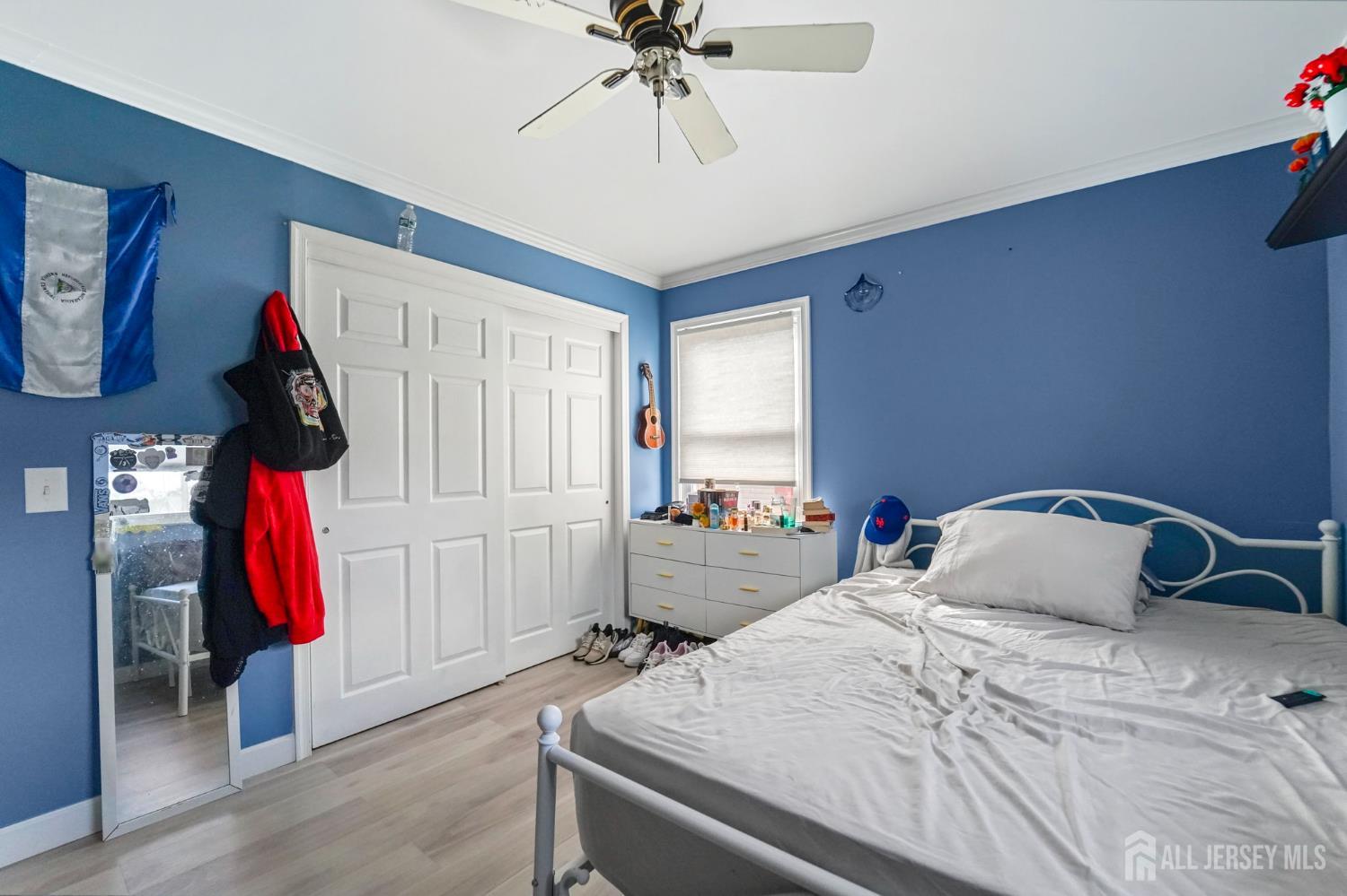 122 3rd Street Middlesex, NJ 08846 - Photo 10 of 24 a bedroom with a bed and a closet