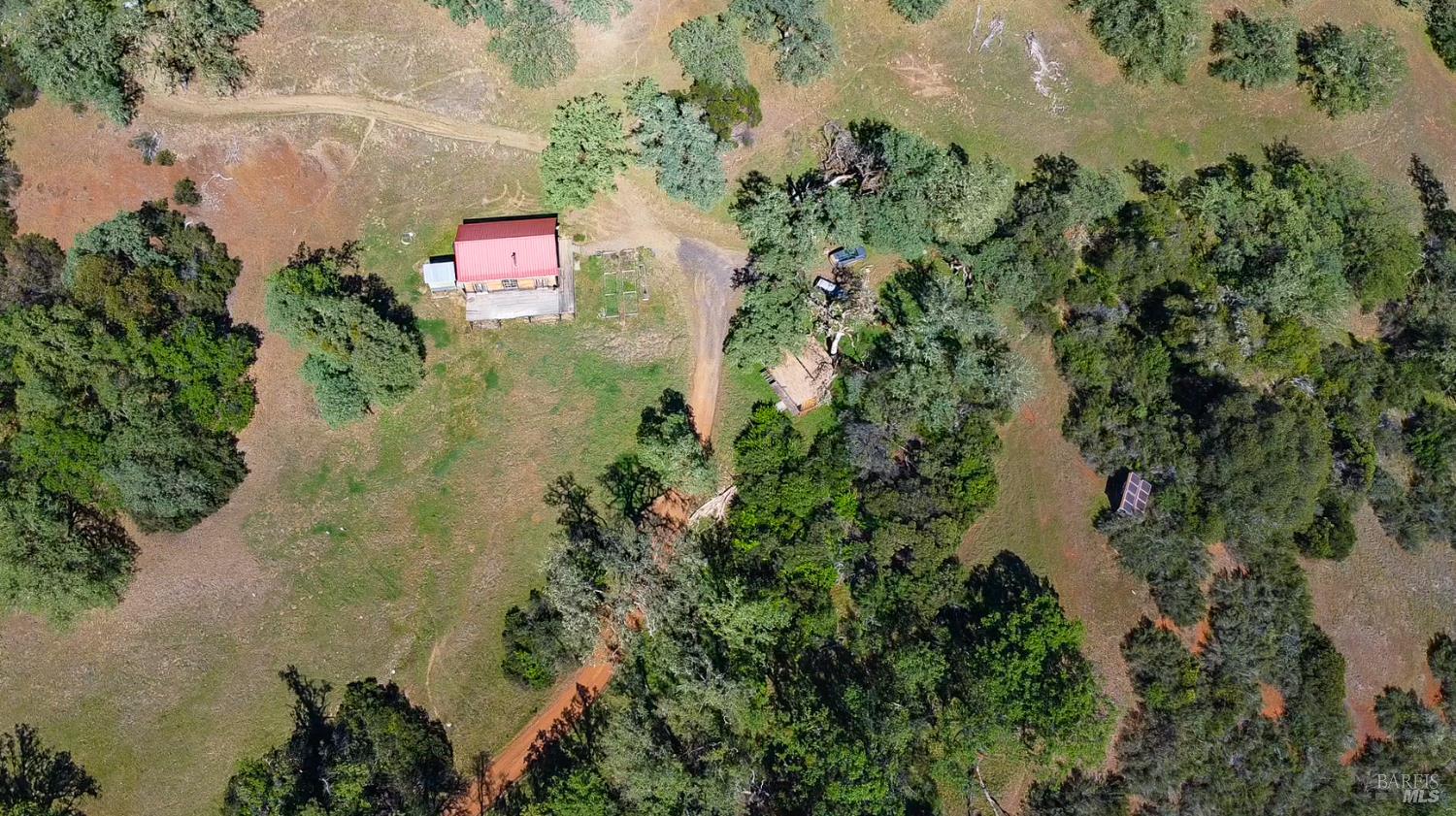 1510 Boonville Road Ukiah, CA 95482 - Photo 4 of 26 an aerial view of residential house with outdoor space and trees all around