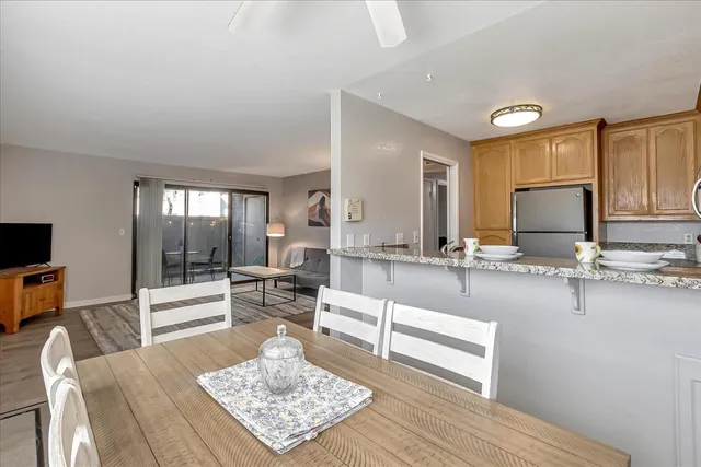 a living room with furniture and a table