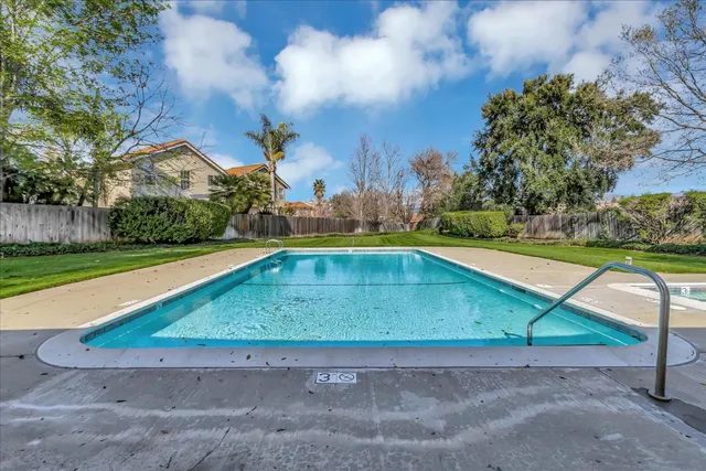 a view of outdoor space swimming pool and green space