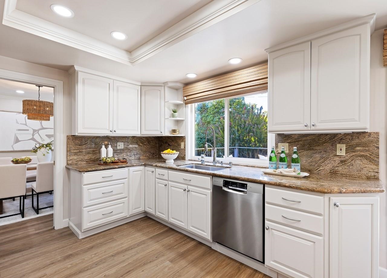 2632 Campeche Court San Ramon, CA 94583 - Photo 14 of 43 a kitchen with a sink window and cabinets