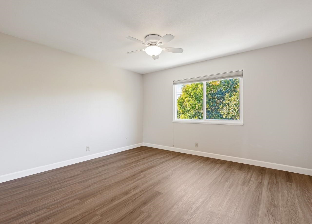 2632 Campeche Court San Ramon, CA 94583 - Photo 31 of 43 an empty room with wooden floor and windows