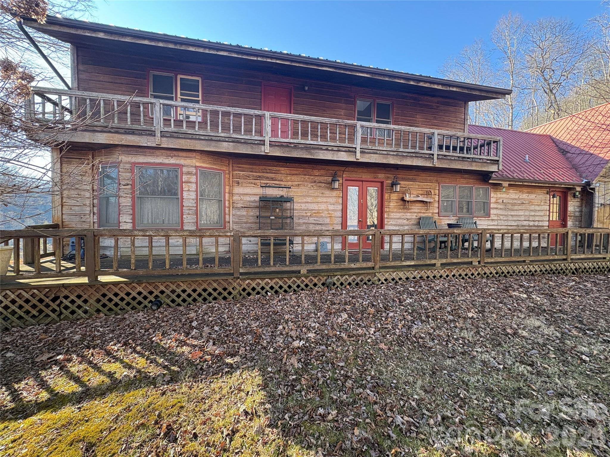 219 Rockinghorse Trail Burnsville, NC 28714 - Photo 2 of 31 a front view of a building