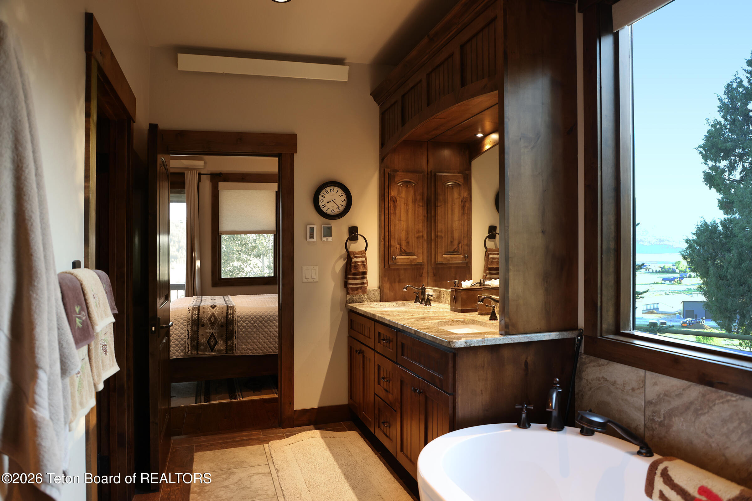 166 Aspen Ridge Trail Alpine, WY 83128 - Photo 20 of 50 18_166_Aspen_Ridge_Trail_MBath_Bedroom