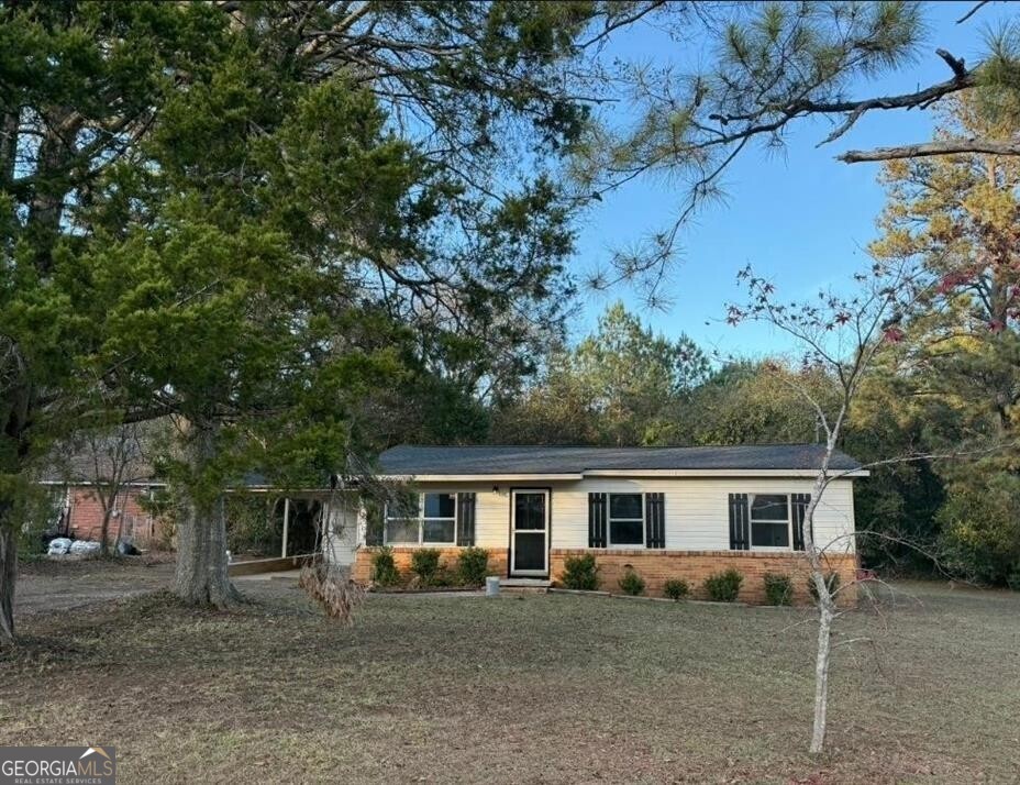 a view of a house with a patio