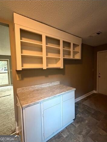 108 Madison Avenue Warner Robins, GA 31093 - Photo 5 of 7 a kitchen with a sink cabinets and a window