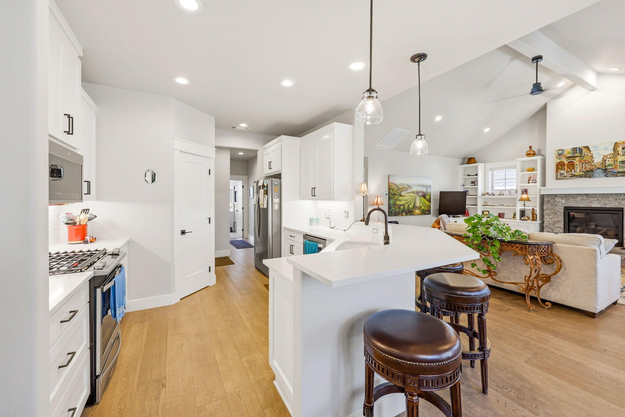 150 Timbers Lane Talent, OR 97540 - Photo 12 of 39 a large white kitchen with a table and chairs