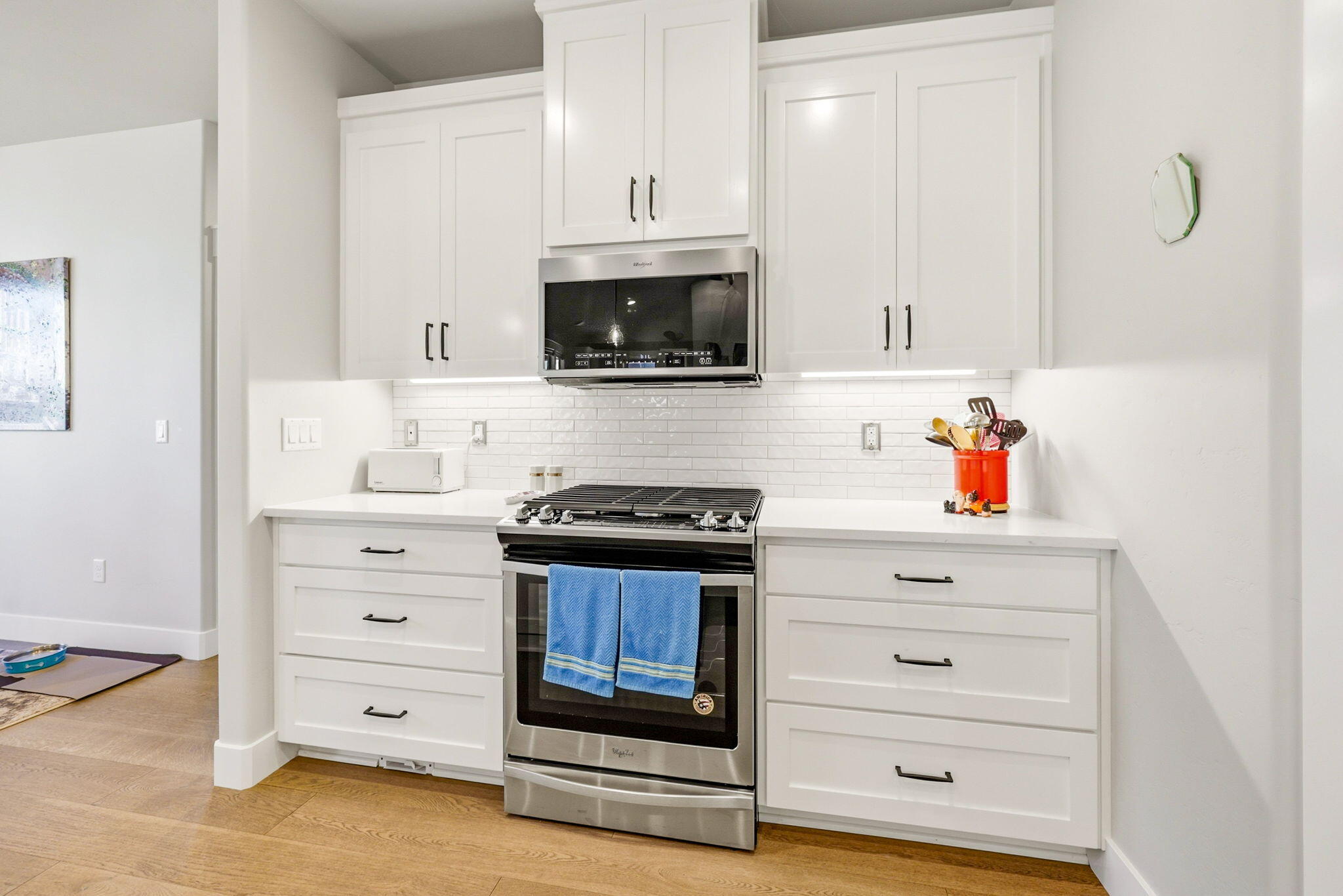 150 Timbers Lane Talent, OR 97540 - Photo 14 of 39 a kitchen with white cabinets and appliances