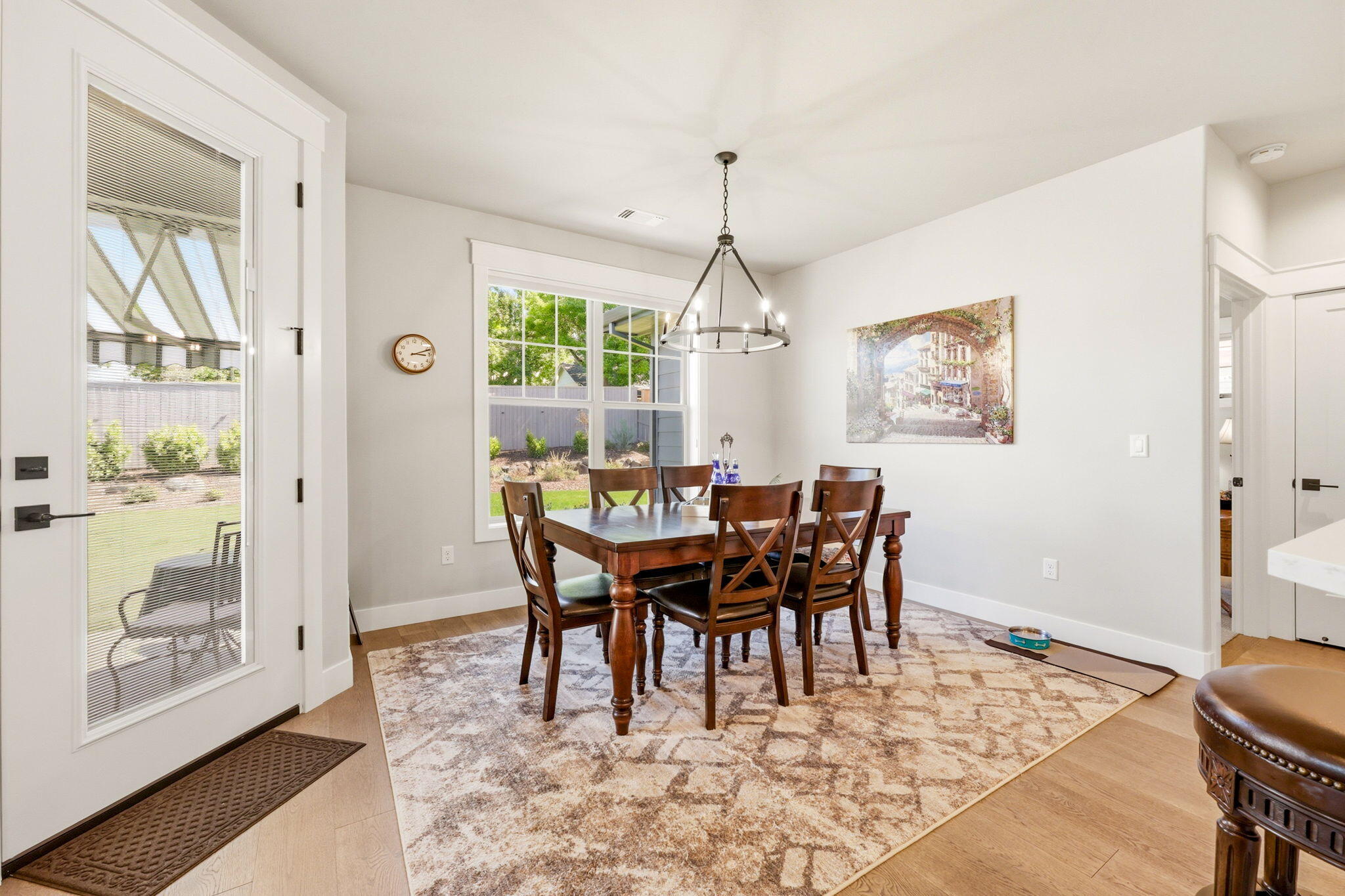 150 Timbers Lane Talent, OR 97540 - Photo 17 of 39 a view of a dining room with furniture window and wooden floor