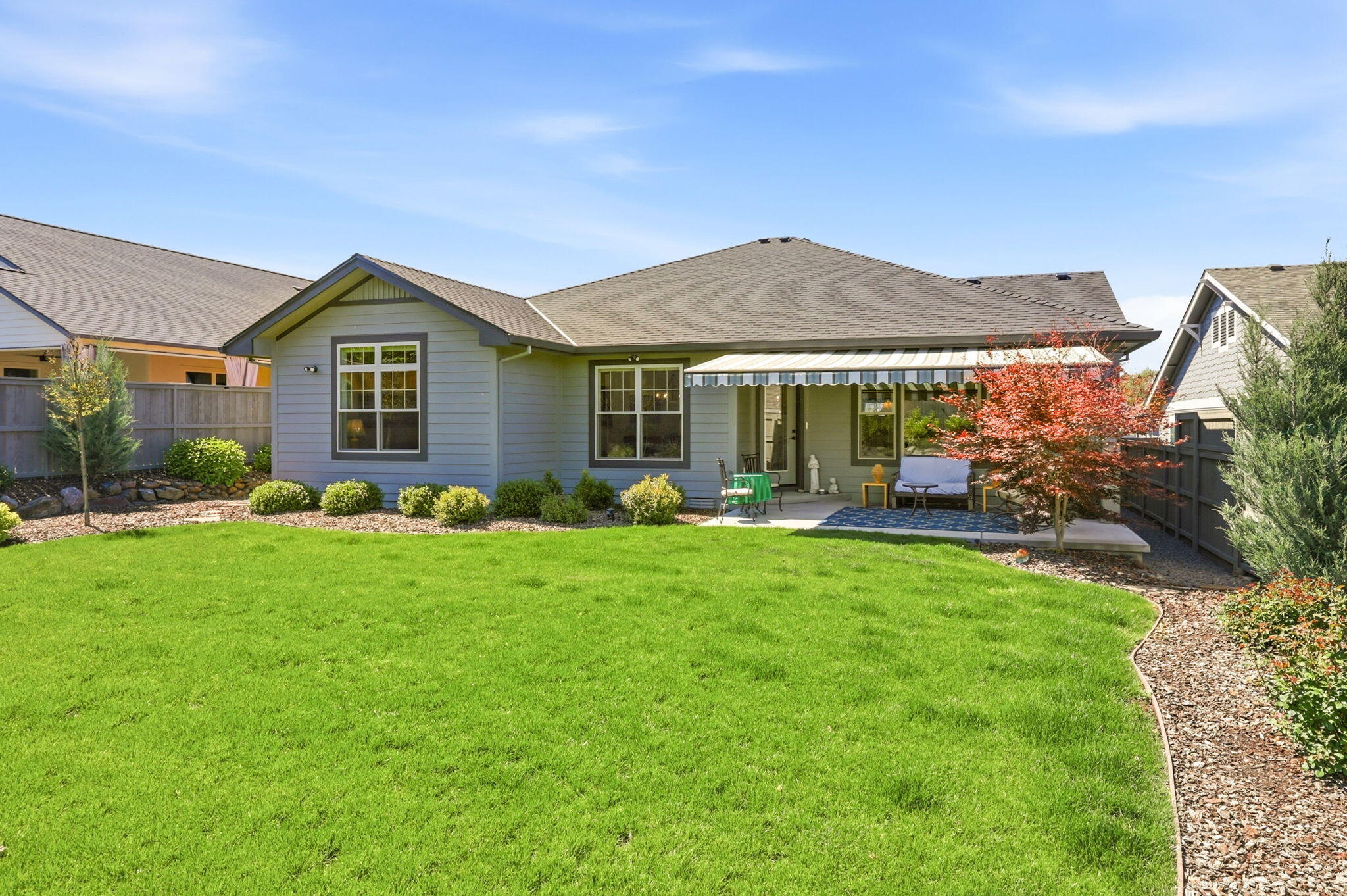 150 Timbers Lane Talent, OR 97540 - Photo 32 of 39 a front view of a house with garden