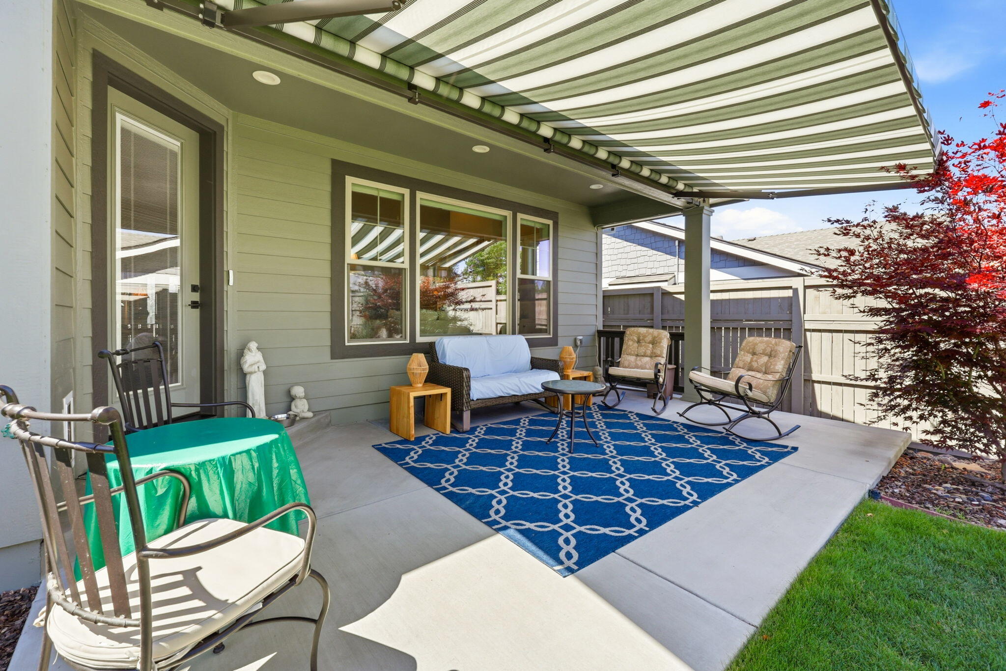 150 Timbers Lane Talent, OR 97540 - Photo 33 of 39 a view of a porch with furniture and floor to ceiling window