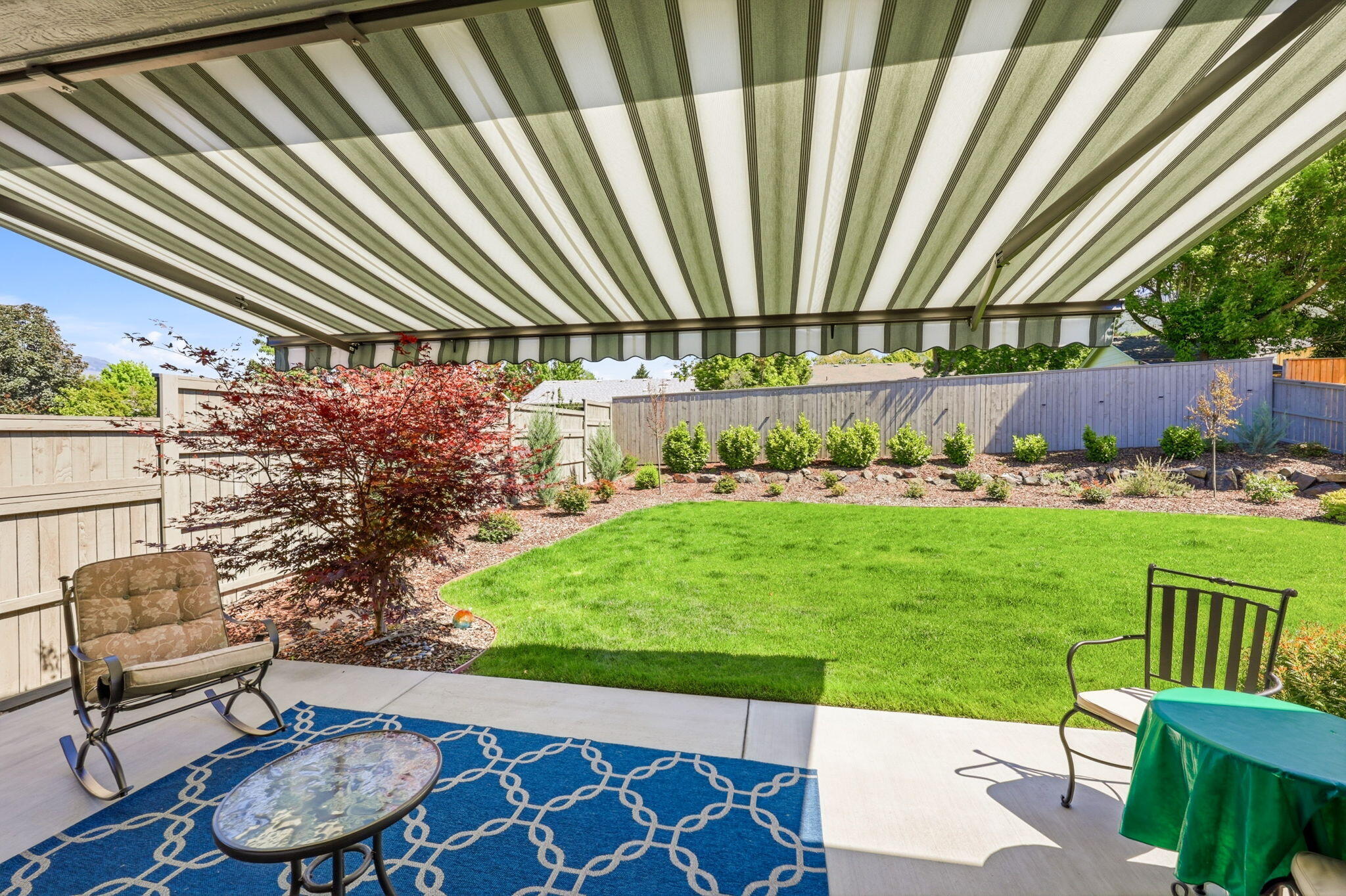 150 Timbers Lane Talent, OR 97540 - Photo 36 of 39 a backyard of a house with table and chairs