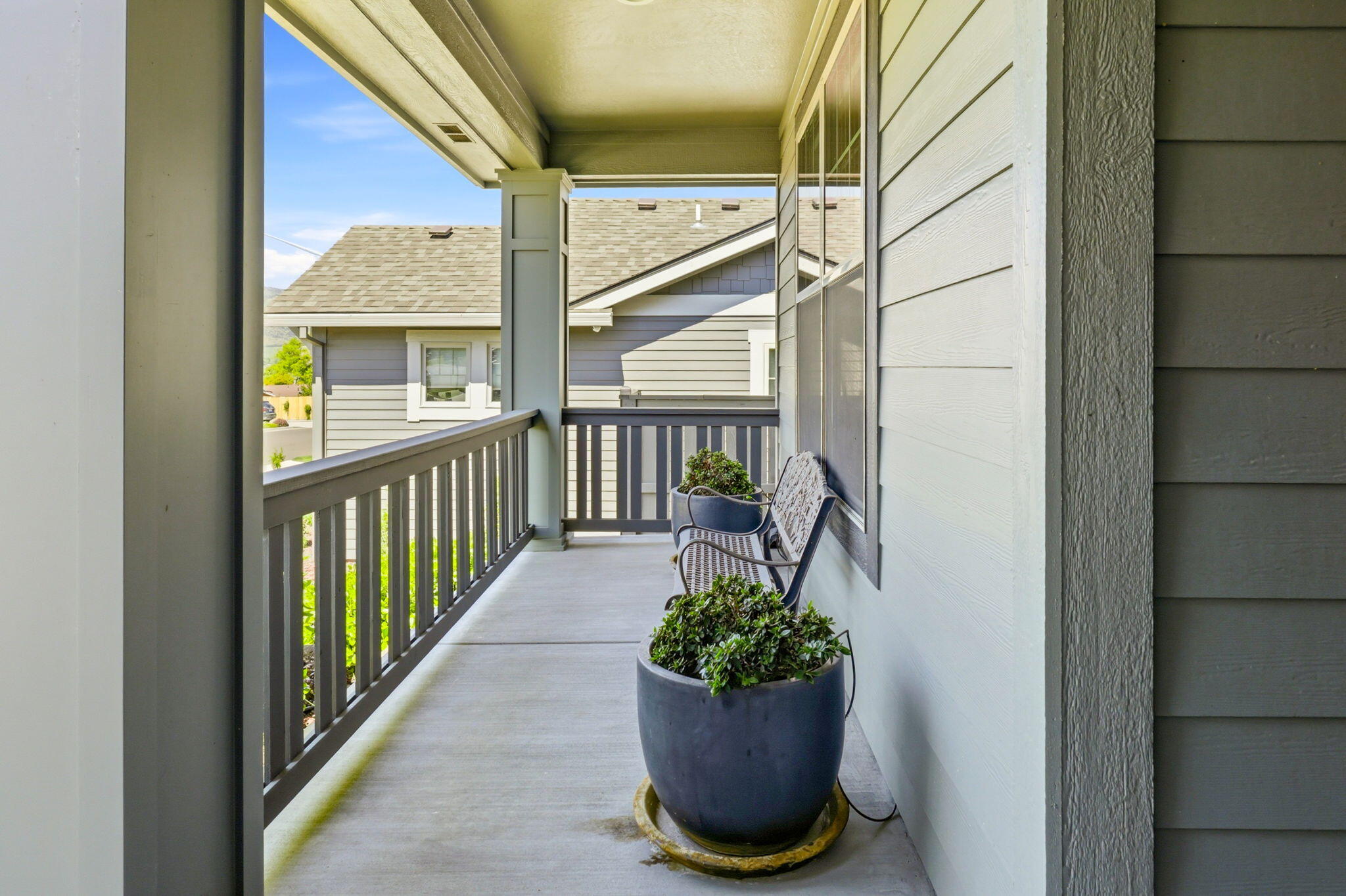 150 Timbers Lane Talent, OR 97540 - Photo 5 of 39 a view of a porch with potted plants