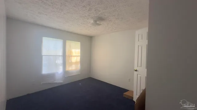 a view of empty room with window