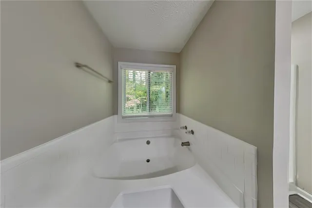 a bathroom with a bathtub