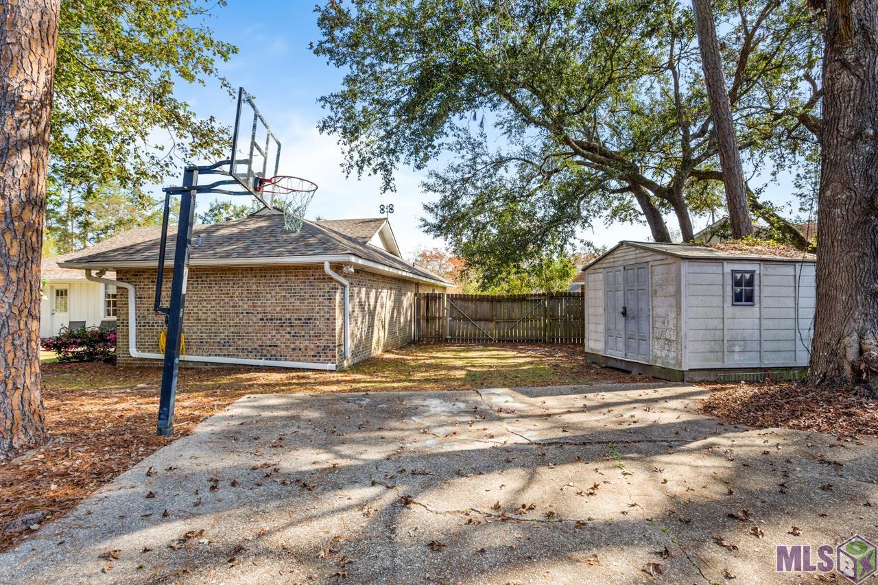 1500 Rue Chartres Slidell, LA 70458 - Photo 20 of 21 Storage Shed & Basketball Court
