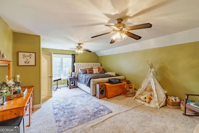 a view of a golf course with a lake