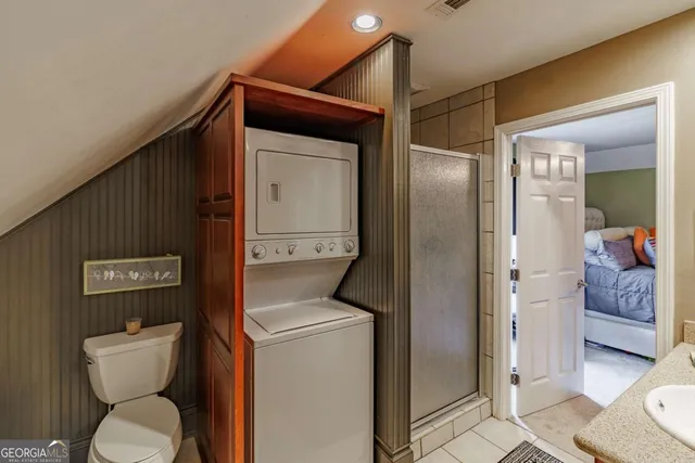 a backyard of a house with barbeque oven