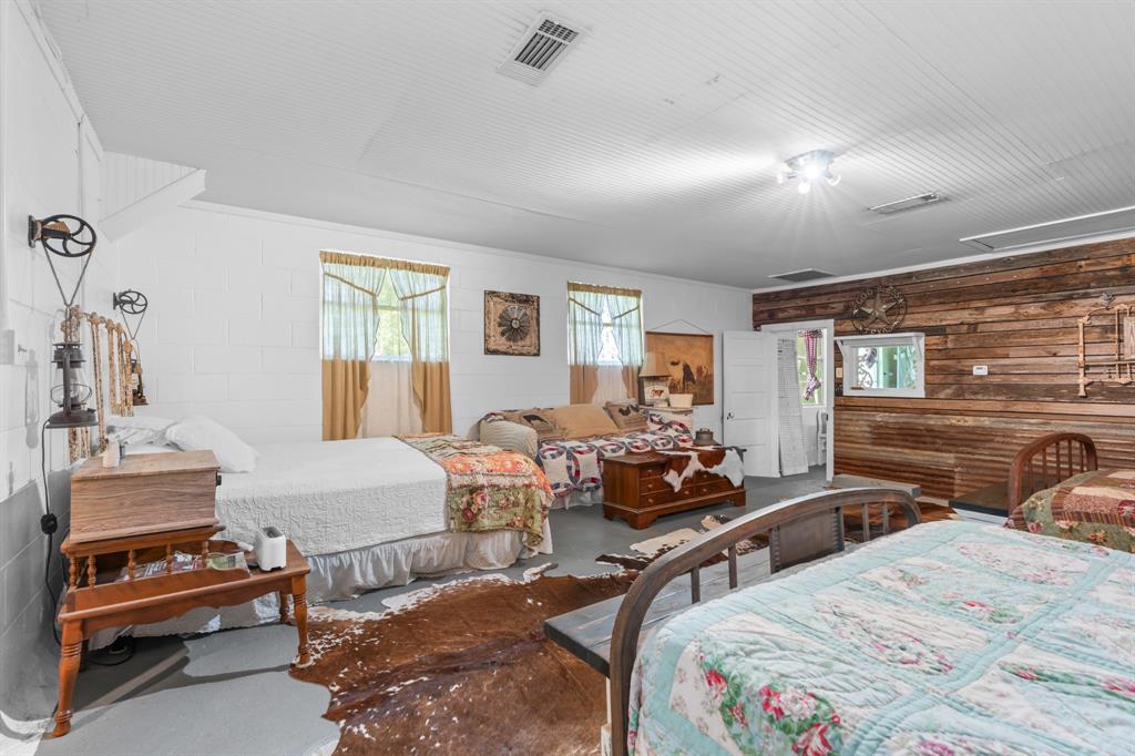 1355 North Houston Street Lorena, TX 76655 - Photo 24 of 40 a bedroom with two beds and a couch