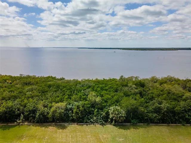 a view of a lake with outdoor space