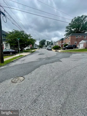 a view of street with houses