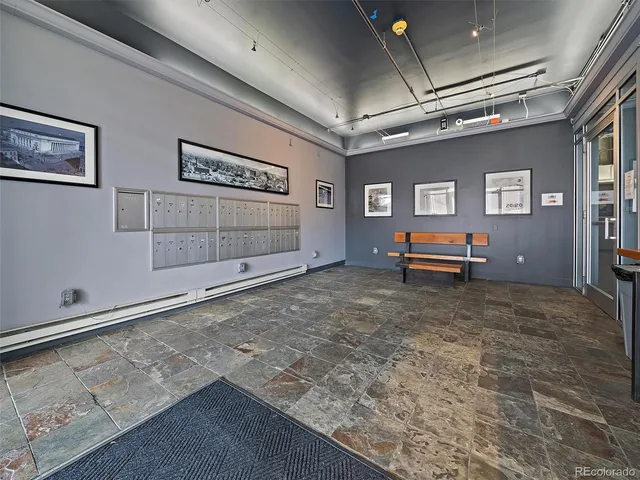 a view of a livingroom with stairs