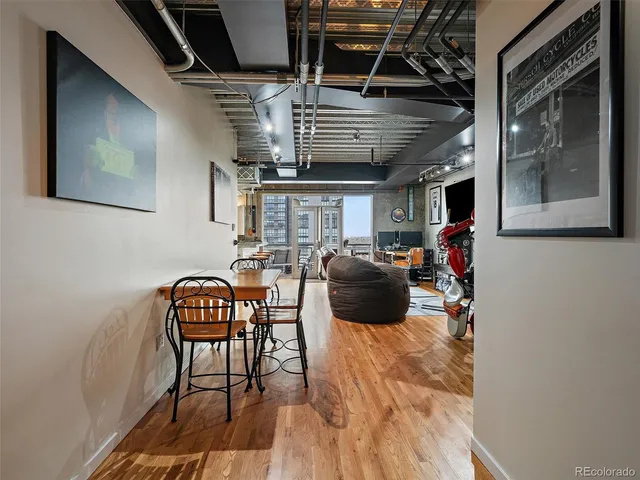 a view of a chairs and table in a room