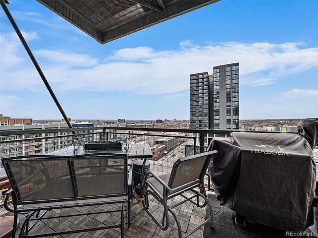 a view of a terrace with sitting area