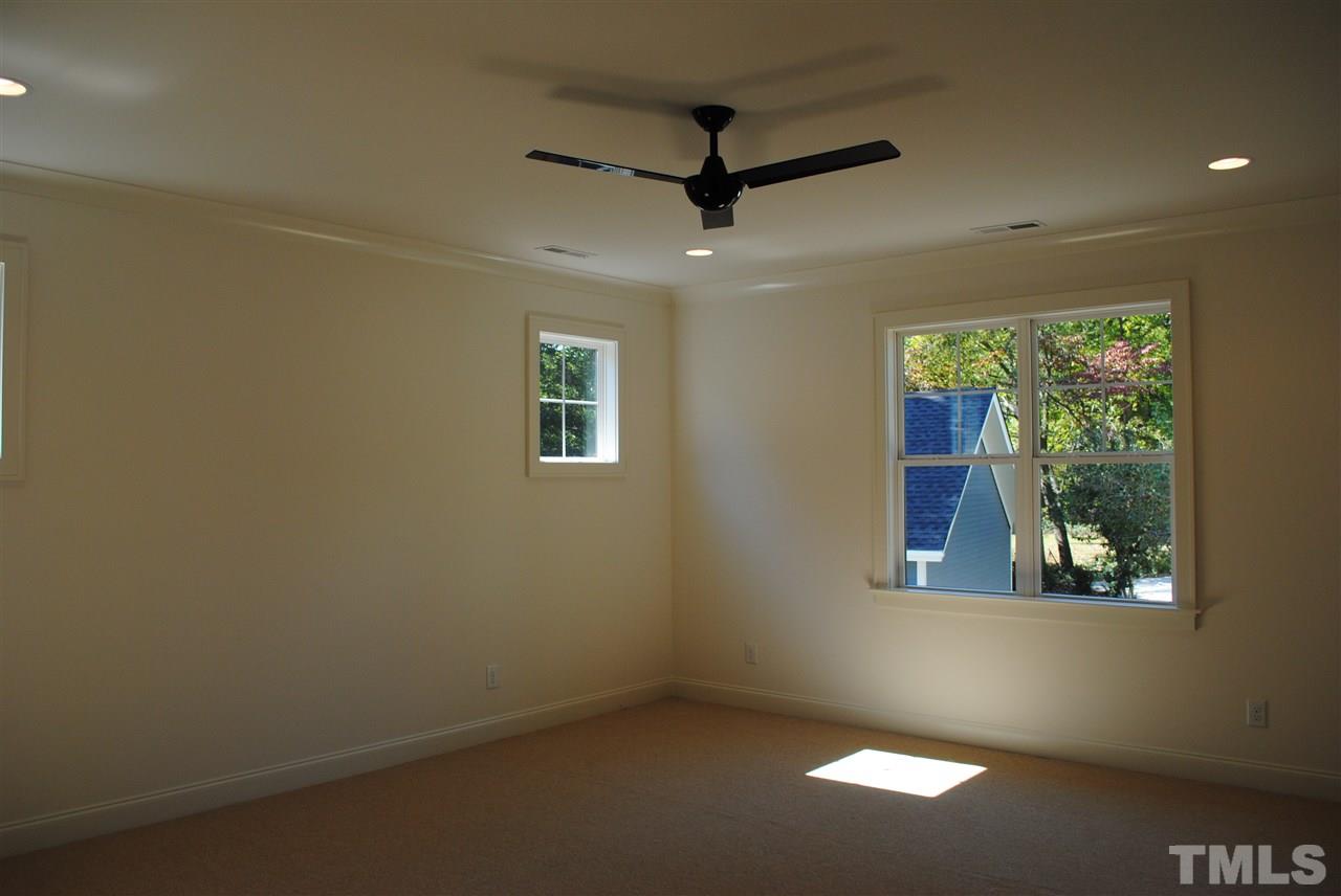 106 Revival Way Raleigh, NC 27608 - Photo 23 of 25 an empty room with a window