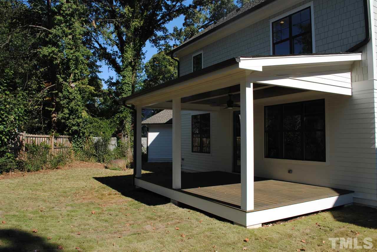 106 Revival Way Raleigh, NC 27608 - Photo 24 of 25 a view of house with tree in front of it
