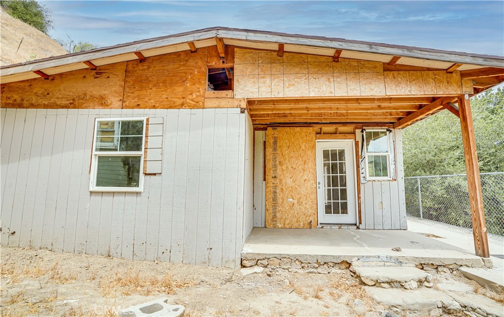 12055 Kagel Canyon Road Sylmar, CA 91342 - Photo 1 of 14 a view of a house with a backyard