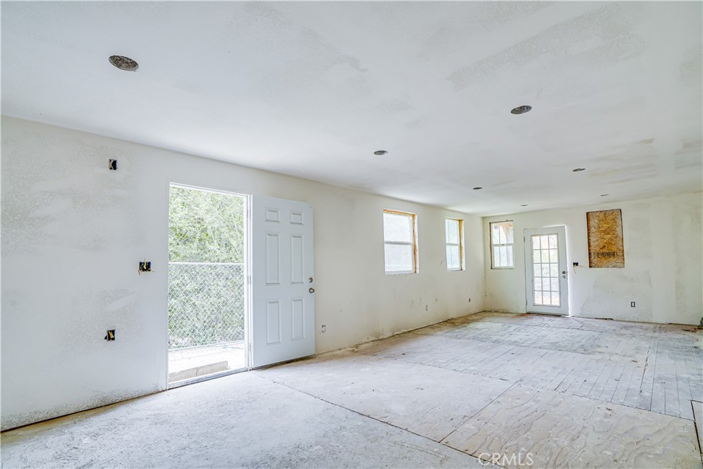 12055 Kagel Canyon Road Sylmar, CA 91342 - Photo 12 of 14 a view of an empty room with a window