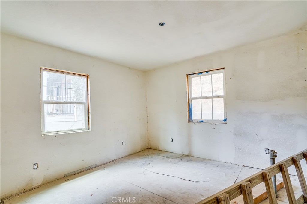 12055 Kagel Canyon Road Sylmar, CA 91342 - Photo 6 of 14 a view of an empty room with a window
