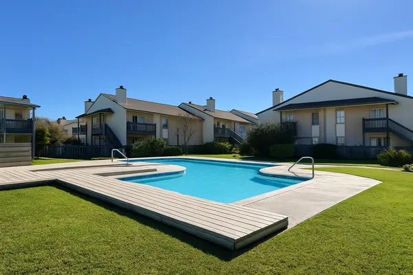 a view of a house with pool and a yard