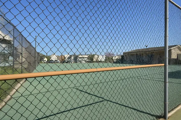 a view of a balcony and next to a wall