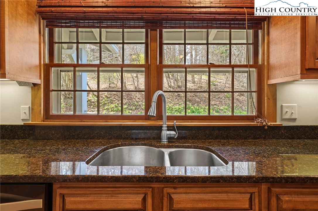 8015 Cloud Forest Lane Blowing Rock, NC 28605 - Photo 13 of 23 a kitchen with a sink and a window